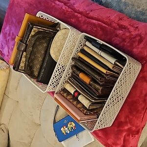 Louis Vuitton and Gucci Chanel wallets